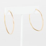 gold hoop earring
