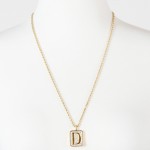 gold D necklace